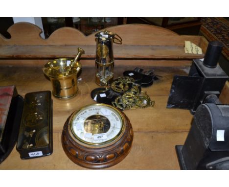 A 19th century brass pestle and mortar; a 1930s oak barometer; a miners lamp; horse brasses; qty