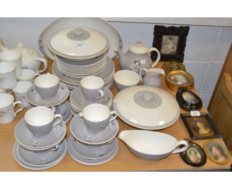 A Royal Doulton Frost Pine pattern dinner service comprising of tureen and cover, dinner plates, dessert plates, teapot , mil