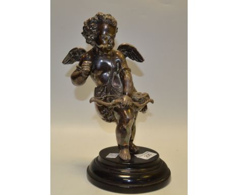 Continental School, a white metal model of a cherub, circular ebonised base, c.1920 