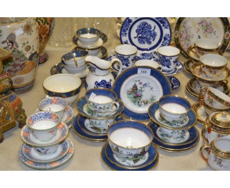 A Crown Staffordshire part tea service; a Copeland blue and white tea service, etc 