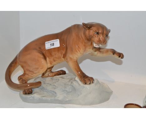 A Beswick Puma on stand,model no. 1702 