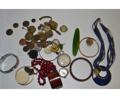 A silver watch case, others; George III halfpenny 1823; other coins; white metal bangle; bakelite napkin ring ; etc 