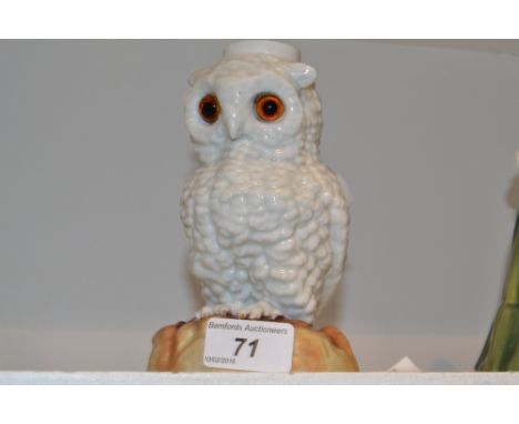 A late 19th century continental Owl lamp base, glass eyes, c.1980