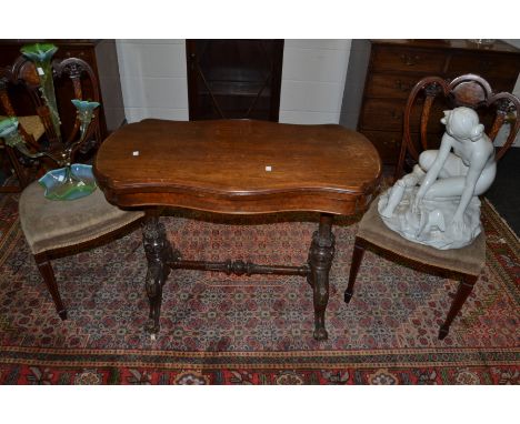 A Victorian mahogany shaped rectangular card table c.1870  