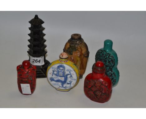 A cinnabar snuff bottle, another; an enamel snuff bottle; an agate and Chinese silver mounted snuff bottle;  etc (6)