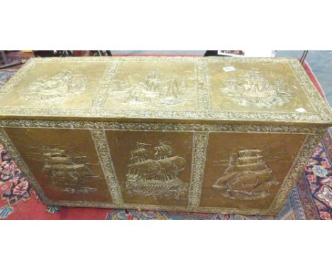 Large vintage embossed brass covered storage chest with sailing ship design 