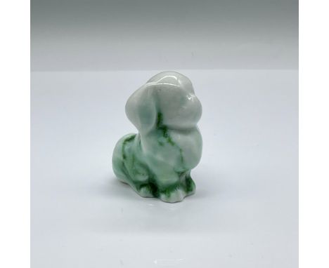 Rare green and white glazed animal figure of a seated Chinese toy dog. Doulton England and Jade marked on the underside. Issu