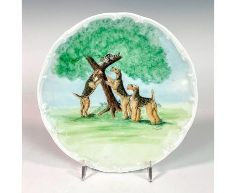 Cute hand painted porcelain collectors plate depicting Terrier dogs trying to play with a cat. Limited edition number 129 of 