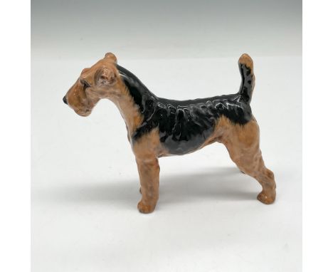 Hand painted figural has dark brown and black coat with light brown underbody. Royal Doulton backstamp. Artist: Frederick Daw