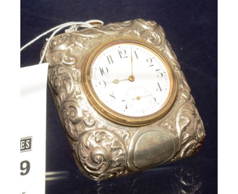 An Edwardian silver cased desk clock, hallmarks for Birmingham, the white circular enamel dial with subsidiary seconds dial a