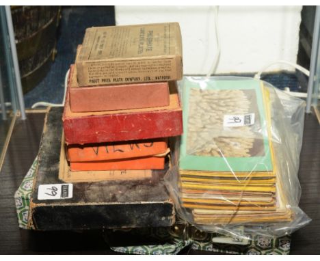 A travelling mah jong set, together with a collection of stereoscopic viewing cards and five assorted boxes of vintage lanter
