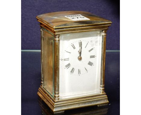 A silver plated cased carriage clock, with white enamel dial and black Roman numerals, 12cm high