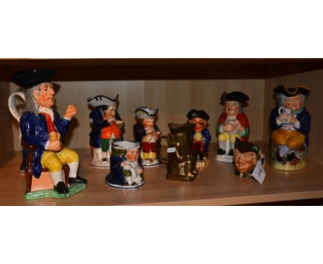 A quantity of ceramic Toby jugs, together with a small Royal Doulton character jug of Robin Hood (10)