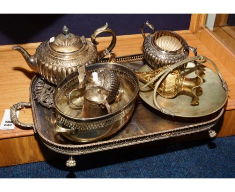 A silver plated tray, together with an Epns three part teaset, comprising teapot, cream jug and sugar bowl, and another jug e
