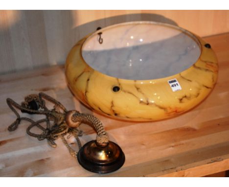 A yellow mottled glass ceiling light, the circular bowl having a ceiling fitment, 40cm wide