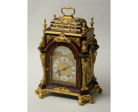 A fine 19th century tortoiseshell and brass bracket clock, with gilt moonphase dial, silvered chapter ring and date aperture,