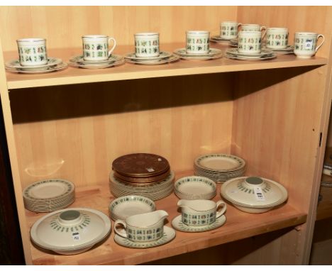 A Royal Doulton tapestry part dinner service, with white glaze, gilt rims and floral and fruit panels (63)