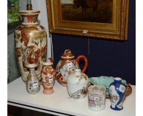 A Chinese famille rose porcelain jar with cover, of cylindrical form, decorated with colourful figures, 9cm high, together wi