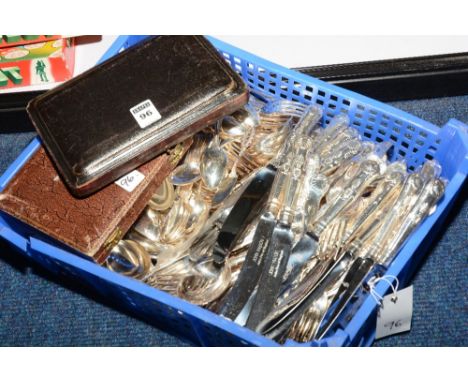 A set of six silver shell decorated spoons and tongs in case, indistinctive marks, together with a silver pickle fork, a silv