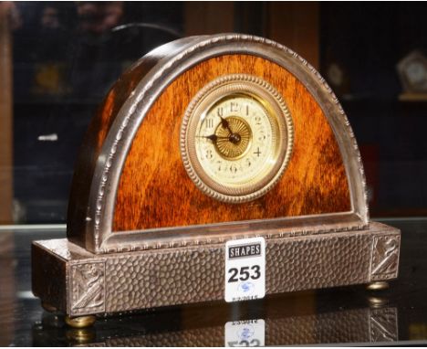A wood bound and hammered pewter mantle clock, with cream enamel dial, 13.5cm high