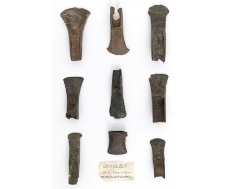 A collection of nine bronze axe heads, Late Bronze Period. Herewith five copy's. L. 5 - 12 cm. Provenance: Collection Carl Gu