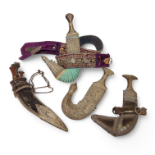 Yemen, four leather and silver-alloy daggers, 19th-20th century,