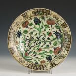 Persia, a polychrome isnik floral plate, 18th century,