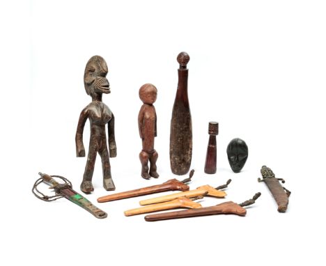 A collection of various objects; Indonesian kris sajen; two African daggers, a Dan, miniature mask, A Bamana female figure an