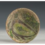 Persia, a light green and black figurative bowl, 17-18th century,