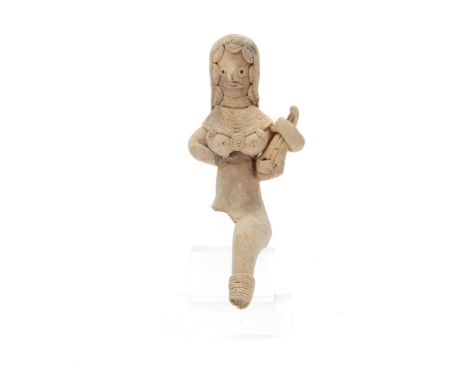 Pakistan, Mehrgahr Period II, 2700 - 2600 BC, rare terracotta idol, of a seated female idol playing a two stringed lute; h. 1