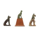 Egypt, three statues of a seated cat, Late Period or earlier;