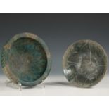 Persia, two green glazed patterned Kashan bowls, 13-15th century.
