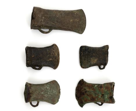 A collection of five bronze socketed axe, Late Bronze Period, ca. 800 BC. all with loops. L. 5,5 - 10,5 cm. Provenance: Colle