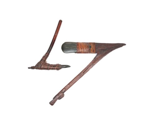 P.N. Guinea, Massim, D'Entrecasteaux island, axe with stone blade, herewith a Sepik adze. l. 77 cm. and 51,5 cm. De Wilma en 