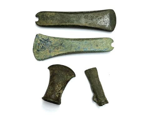 Hallstatt, two bronze axe heads, ca. 750 BC and two socketed bronze axe heads, Late Bronze Period. L. 16, 7,5 and 8 cm. Prove