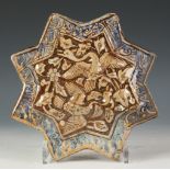 Iran, a Keshan star-shaped tile, ca. 13th-14th century,