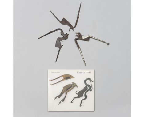 Bali, two betel cutters shaped as a horse. Herewith a cutter shaped as a bird and a book on betel cutters. L. ca. 18,5 cm. [4