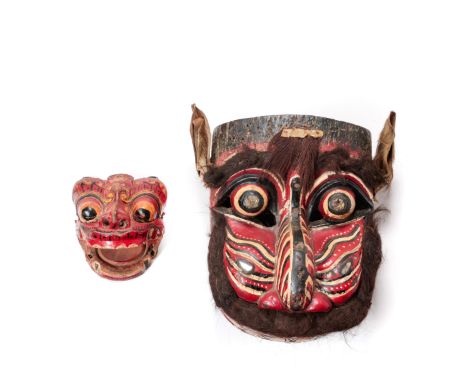 Bali, two zoomorphic performance masks, the larger trimmed with ijuk. L. 36 and 22 cm. [2]