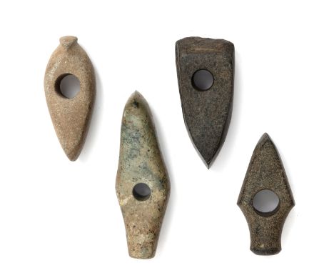 A fine collection of four stone boad shaped axe heads, Middle European, Early - Middle Bronze Age, ca. 2000 BC; one with a ta