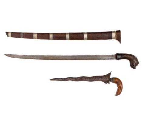 Sumatra, Bugis, kris and a klewang. L. 40,5 and 78 cm. [2]