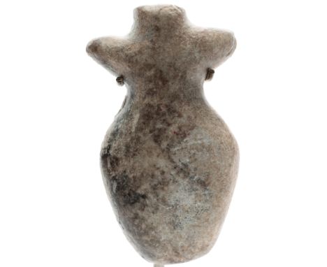A marble idol, Greek, ca. 4th Mill BC; a stylized female torso; h. 4 cm. mounted. Provenance: Belgium collection Lundahl, 196