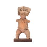 Mexico, Veracruz, ca. 600-900 AD, standing terracotta male smiling figure, soriente