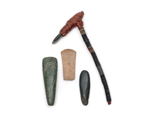 Melanesia, three stone blades and an adze L. 14,5 - 22,5 (blades) and 45 cm. [4]