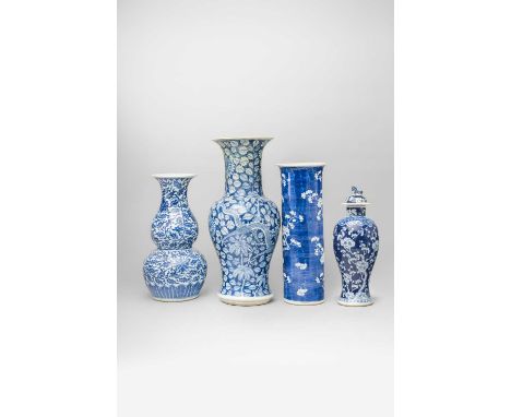 FOUR CHINESE BLUE AND WHITE VASES19TH CENTURYComprising: a yen yen vase and a cylindrical vase, both with a Kangxi mark; a ba