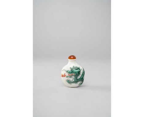 A CHINESE MOULDED AND ENAMELLED 'DRAGON' SNUFF BOTTLEFOUR-CHARACTER DAOGUANG MARK AND OF THE PERIOD 1821-50The ovoid body mou
