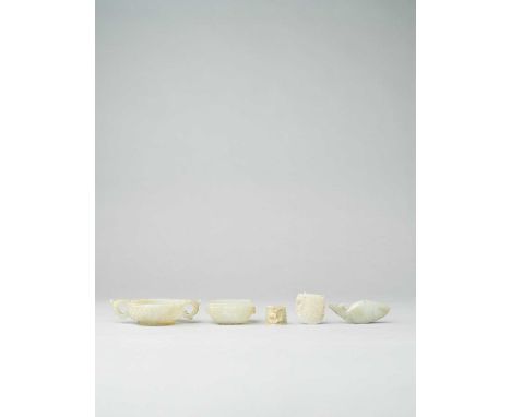 A COLLECTION OF CHINESE CELADON JADE CARVINGS QING DYNASTY  Comprising: a small bowl decorated with bosses and two chilong-sh