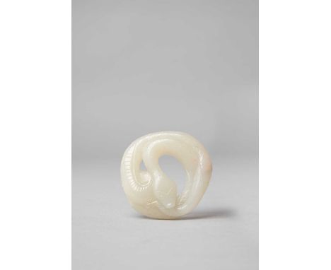 A CHINESE WHITE JADE CARVING OF A SNAKEQING DYNASTY OR LATERThe serpent of flattened form, depicted coiled around itself with