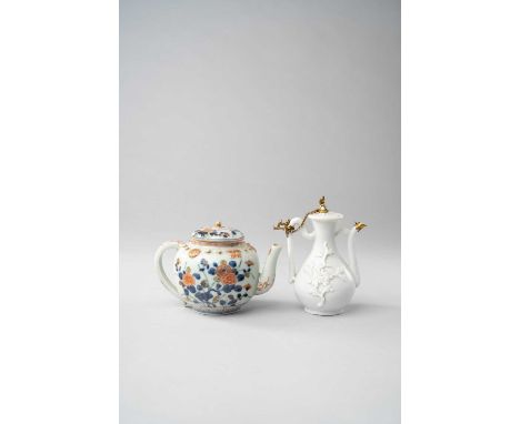 A CHINESE BLANC DE CHINE EWER AND COVER AND A JAPANESE IMARI TEAPOT AND COVER BOTH EARLY 18TH CENTURYThe ewer moulded with ch