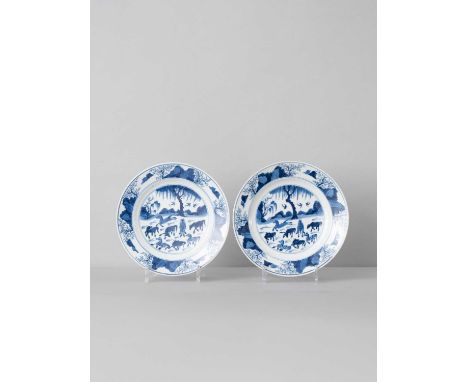 A PAIR OF CHINESE BLUE AND WHITE 'EIGHT HORSES' PLATESKANGXI 1662-1722Painted with the horses of Mu Wang grazing in landscape