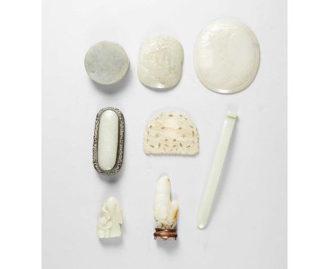 A COLLECTION OF CHINESE PALE CELADON JADE CARVINGSQING DYNASTYComprising: a carving of two pea pods mounted on a wood stand; 